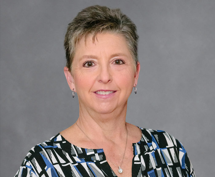 Headshot photo of Annette Wilson, Sydney Administrators